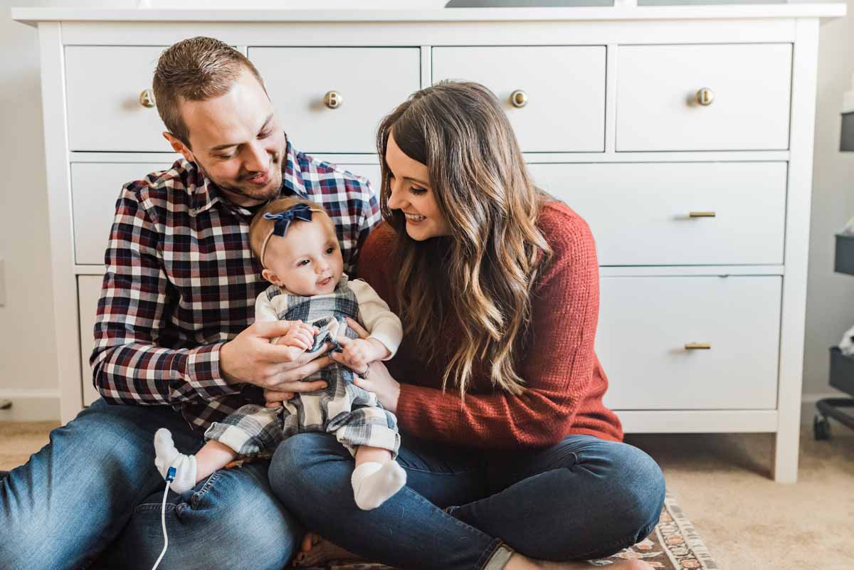 Sawyer’s Family Photo of happy Sawyer and her parents