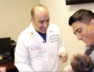 Dr Chmait smiles as he meets the infant on whom he performed fetal surgery for spina bifida
