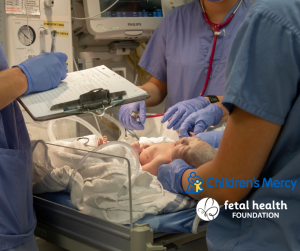 A healthcare team of specialists assists a newborn